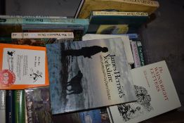 A carton of books about the Yorkshire Dales and Lake District including 'The Wainwright Letters'