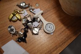 6 wrist watches all in various colours.