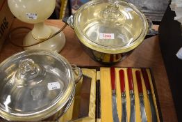A fine Art Deco design silver plated tureen with fitted glass inner, along with a similar tureen and