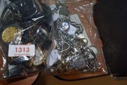 A selection of wrist watches having black straps or in silver tones