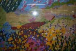 (20th century), a woolwork picture, stylised landscape, 34 x 48cm, mounted framed and glazed, 55 x