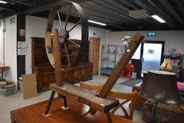 An oversized decorative 'spinning wheel'