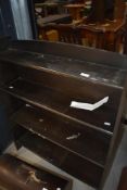 A vintage dark stained bookshelf