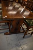 A good quality reproduction oak , probably Titchmarsh and Goodwin, refectory style dining table,