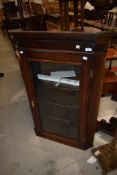 A 19th Century oak corner display cabinet