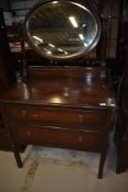 An early 20th Century oak dressing table , similar to wardrobe lot 913