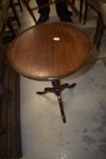 A reproduction mahogany wine table