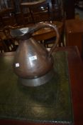 An Antique copper gallon measure, stamped Naughton, Edinburgh