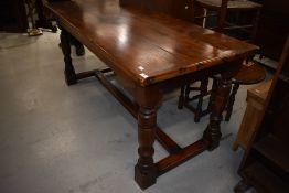 A good quality reproduction oak , probably Titchmarsh and Goodwin, refectory style dining table,
