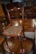 A Victorian mahogany cane seated bedroom chair