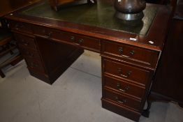 A reproduction Regency style pedestal desk