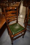 A set of six good quality reproduction oak ladder back dining chairs, probably Titchmarsh & Goodwin
