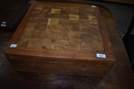 A solid wood chopping block , approx. 45 x 45 x 15cm