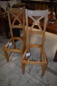 A pair of modern Oak Furniture land dining chair frames (no seats)