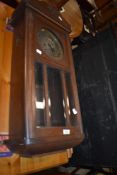 An early 20th century Vienna style wall clock