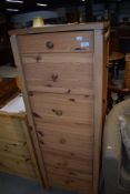 An Ikea tall chest (trandum)
