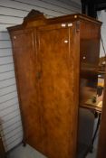 An early 20th Century walnut wardobe