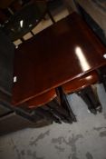 A reproduction occasional nest of tables
