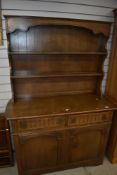 A vintage Old Charm or similar oak dresser