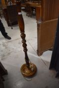 A traditional stained frame standard lamp