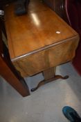 A Regency revival side table having drop flaps