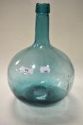 A vintage Vilella teal blue glass two litre demi john/ wine bottle.