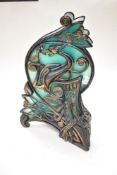 A late 1990s Gillian Hobson composite figurine, of semi translucent green resin with celtic design