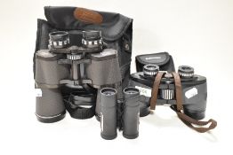 Three pairs of binoculars, including Frank Nipole and Halina discovery.