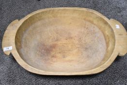 A large 19th century primitive wooden salting trough having handles.