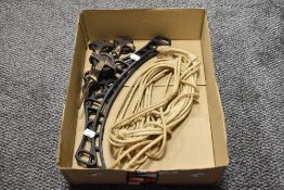 Two cast iron Shelia maid brackets, pulley and rope.