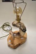 A rams horn and burr maple table lamp with oversized decorative bulb.