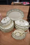 A collection of Royal Doulton 'Countess' dinner service having ivory ground with green swag and
