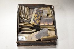 A collection of antique segments of bone, horn and tortoiseshell.
