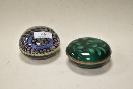 A vintage milliefiori paperweight, unsigned, and a green cloisonné trinket box with quilted velvet