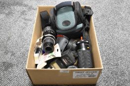 A selection of camera accessories including lenses, flashes and more, to be included are a Helious