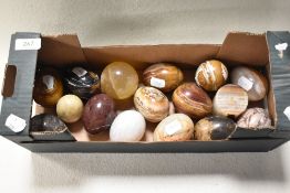 A collection of natural stone eggs, including marble etc.