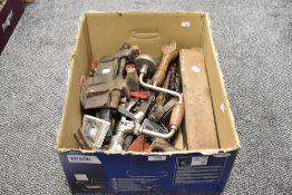 A selection of predominantly vintage hand tools, including bit and brace, box plane, stilsons and