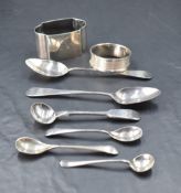 A group of mixed silver spoons and napkin rings, various, gross silver weight 126grams