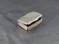 An early 20th century silver pill box, of plain hinged rectangular form, marks for Birmingham