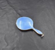 A George V miniature silver and guilloche enamel hand mirror, of traditional design, engine-turned