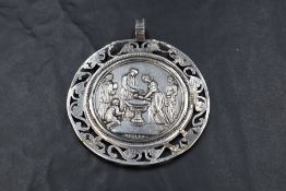 A rare early 19th century Austro-Hungarian white metal baptismal medal, Vienna, of circular form