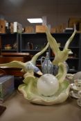 A large mid century Italian made ceramic table centre piece lamp of two mallard ducks in flight over