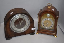 An early 20th century Smiths mantel clock and a similar bracket style clock by Elliott