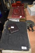 A Victorian photograph album and a postcard album with three Post Office penny saving banks