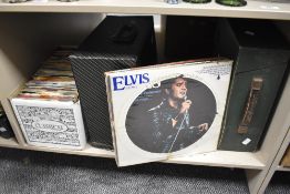 Two vintage vinyl cases containing shellac 78rpm records and 33rpm albums with a box of assorted