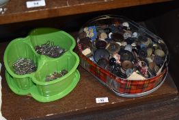 Two boxes of vintage buttons and fastenings.