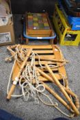 An early 20th century childrens wooden toy block set and a rope swing
