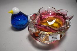 A art glass bowl in pink and yellow hues with an Iittala style glass bird figure.
