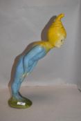 An early 20th century composite figure of a pixie possibly relating to Enid Blyton. It has had a
