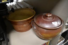 Two vintage earthen ware cooking pots including a lidded crock pot and a large cream bowl